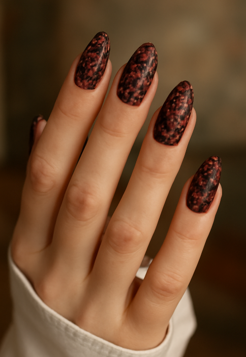 red nails with black design