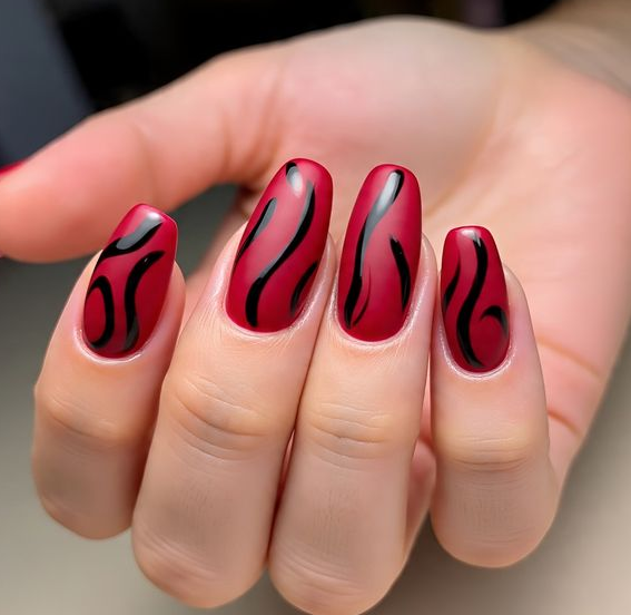red nails with black design