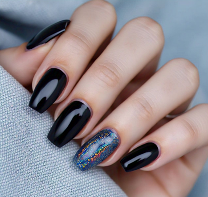 It’s a deep black nail design with a glitter accent nail that looks like stars shining in the night sky