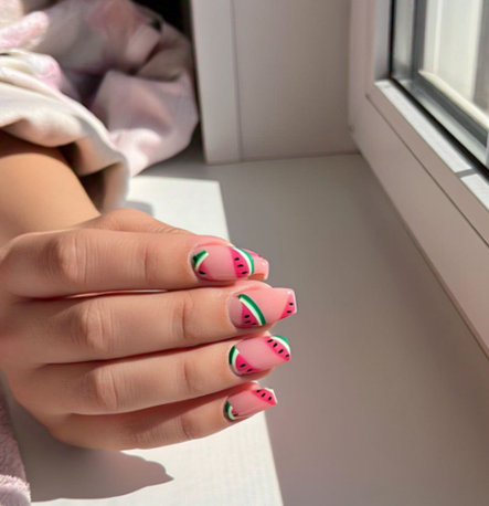 This fun nail designs look uses soft pink and mint colors with small dot details that look like cute fruit seeds