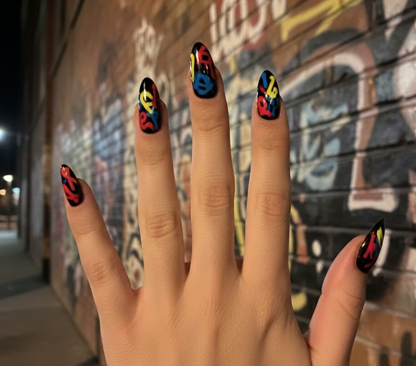 Deep black base with bold crimson, cobalt, and yellow graffiti strokes, giving a secret, rebellious street-art vibe