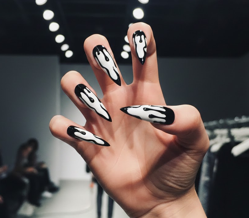 French manicure with a drip twist at the tips, elegant and modern drip nails style