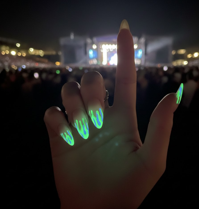 Glow-in-the-dark drips over matte nails, white by day and glowing at night, fun and bold drip nails