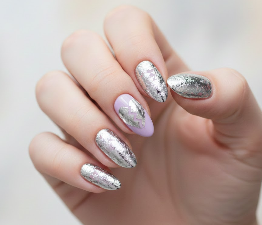 Lavender nails with delicate silver foil forming broken heart patterns, dramatic and elegant