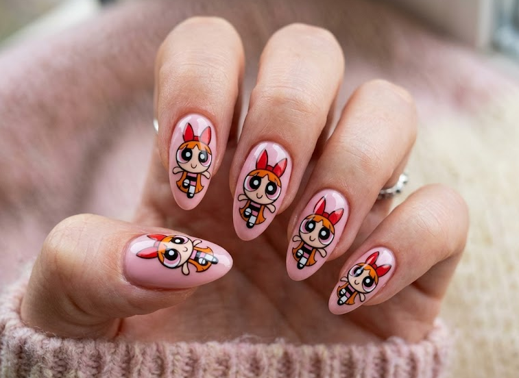 Blossom nails on soft pink base, cute and playful Powerpuff Girls design