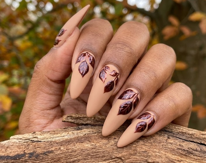 Copper Beech – Stiletto shaped nails: Soft tan base, deep copper beech leaves near cuticle, matte & shiny contrast, spring nails.