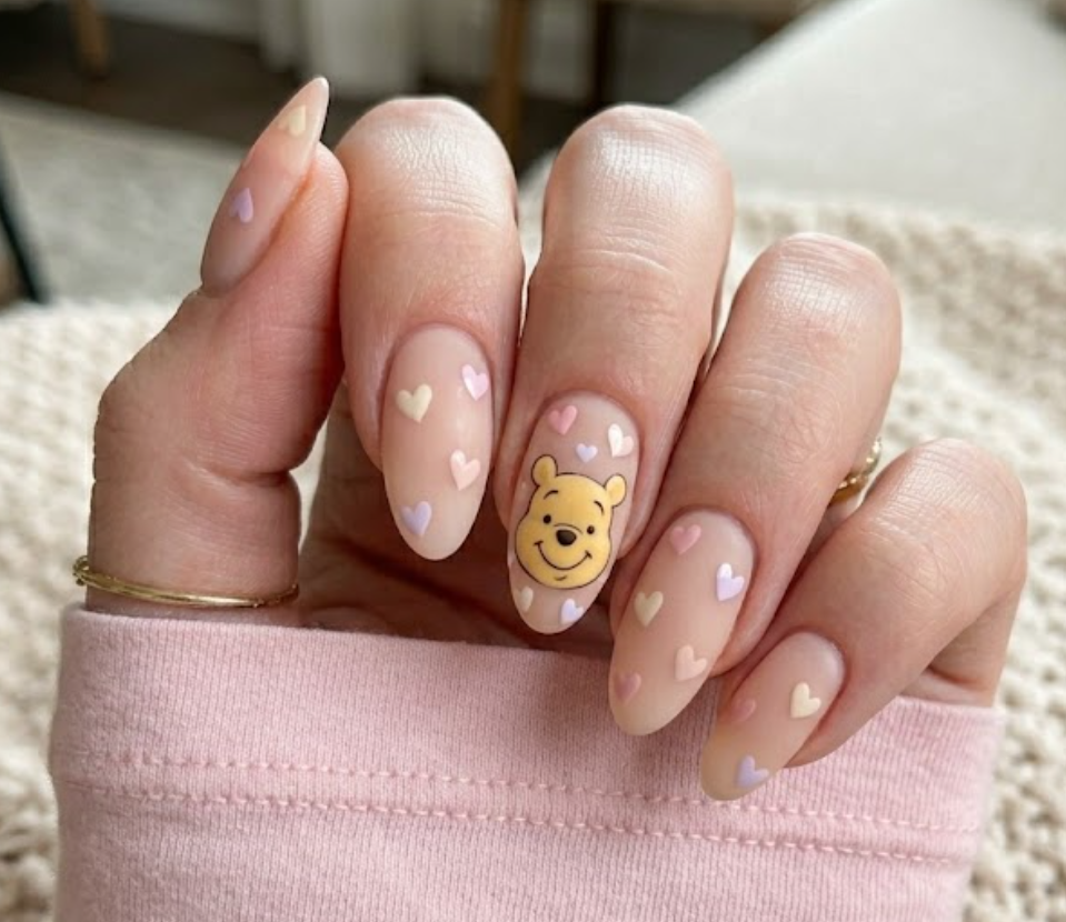 This design features a close-up of Pooh’s face with soft hearts