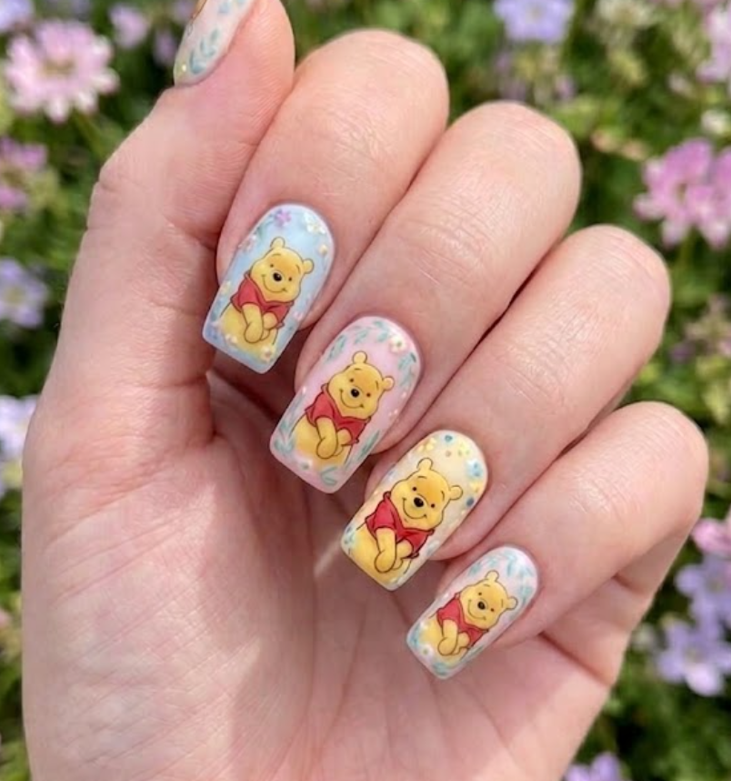 This design shows Pooh sleeping on clouds