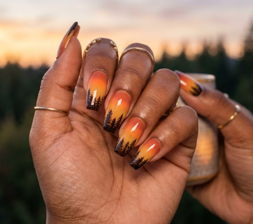This nail art shows Winnie the Pooh with a sunset gradient and forest silhouette, giving a warm evening vibe from his woodland home.