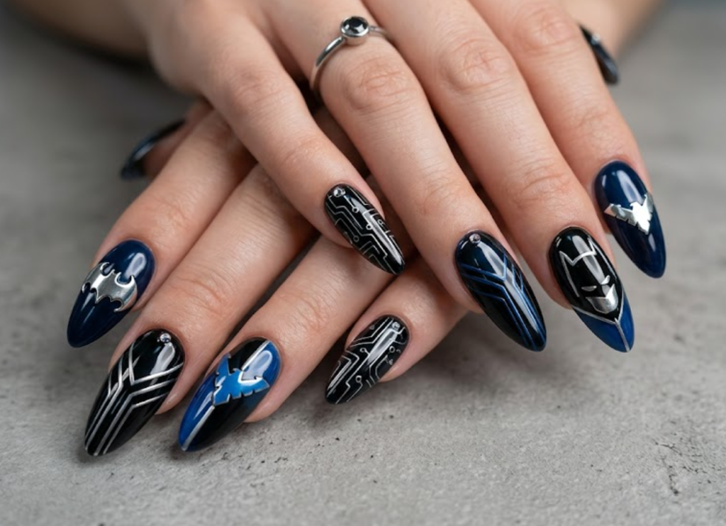 Full hand Batman Nightwing dark blue and black futuristic nails with silver accents on a simple background