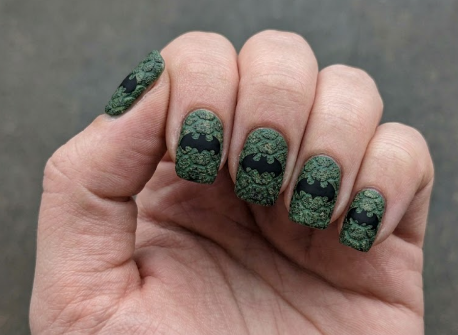 Full hand Batman Ra’s al Ghul dark green black and gold luxury nails on a simple background