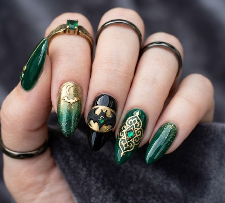 Full hand Batman Talia al Ghul emerald green glossy nails with gold details on a simple background