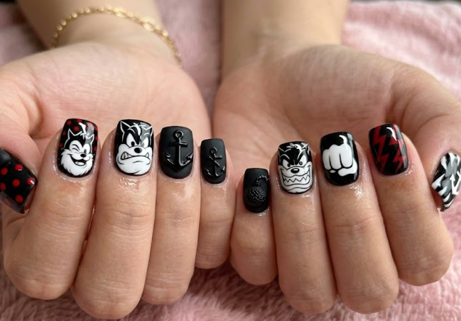 Pete inspired black villain-themed nail art with bold lines, dramatic accents, and cartoon character styling.