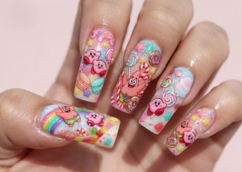 In this photo, Patrick Star and Kirby decorate a sweet candy-themed nail set with donuts, macarons, lollipops, and colorful treats.