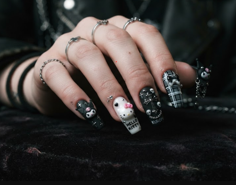 Edgy Hello Kitty and Kuromi themed manicure close-up shot.