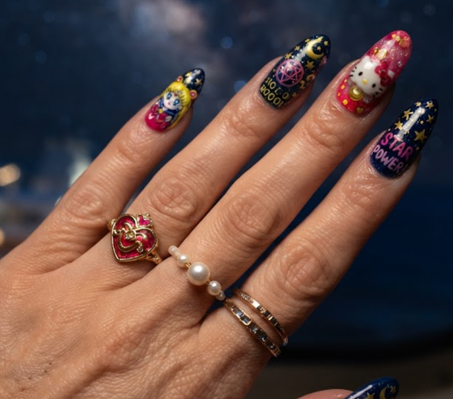 Pop-culture inspired Hello Kitty and Sailor Moon crossover nail art.