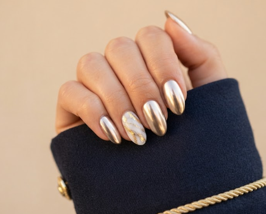 White pearlescent glazed donut honeymoon nails decorated with a dangling pearl charm.