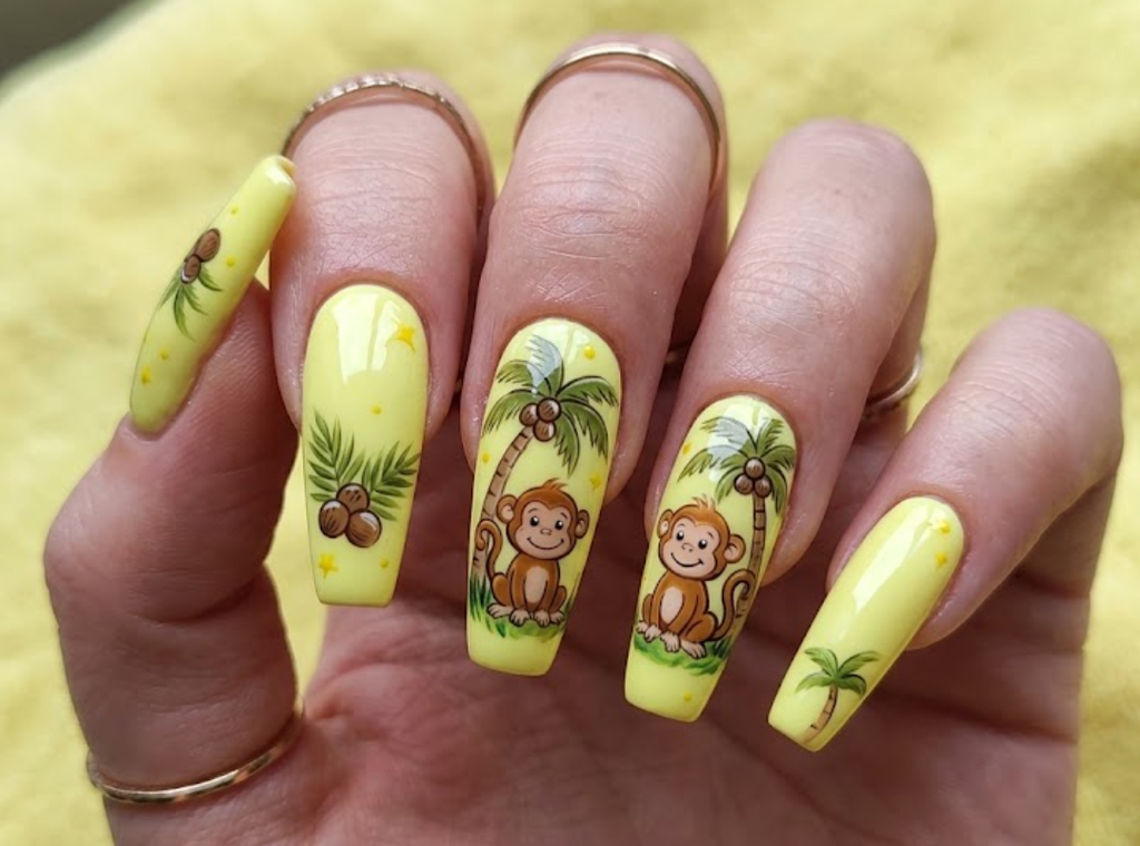 In this image, nude nails with minimalist cartoon monkey line art